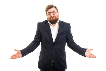 Portrait of business man showing don't know gesture.