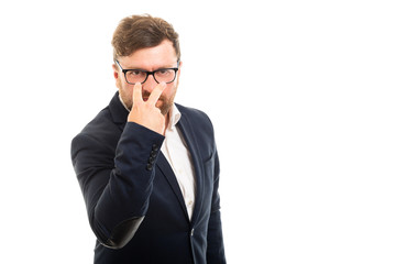 Fototapeta premium Portrait of business man showing watching you gesture.