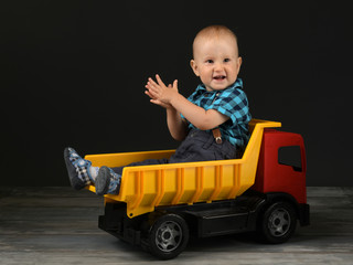Boy with his toy car