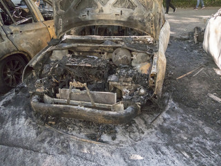 Fototapeta na wymiar Completely burnt out car
