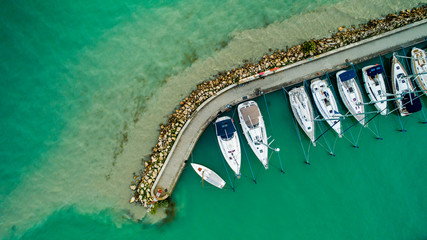 Sailboats and small yachts anchored at Lake Balaton, Hungary. Aerial view. - obrazy, fototapety, plakaty