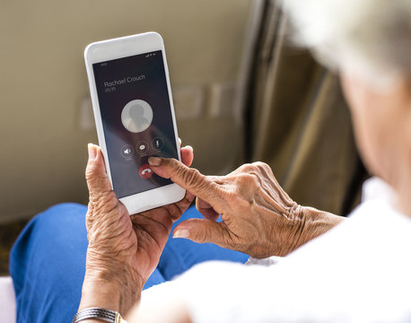 Senior woman hanging up the phone