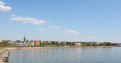 Fototapeta na wymiar View from the shore of Munkkisaari district, Helsinki