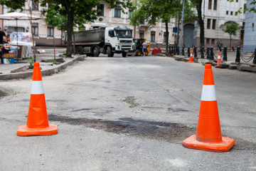 Plastic road cone. Road sign for temporary fencing while carrying out repairs on the road