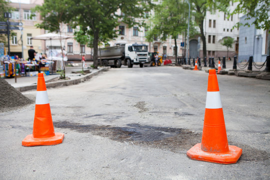Plastic road cone. Road sign for temporary fencing while carrying out repairs on the road