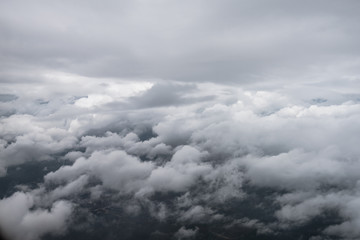 Fototapeta na wymiar stormy sky view from window of airplane