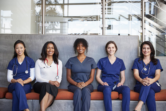 Female Healthcare Workers Sitting Together In A Hospital