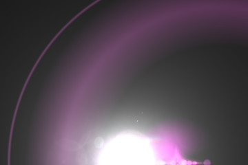 Abstract lens flare light over black background