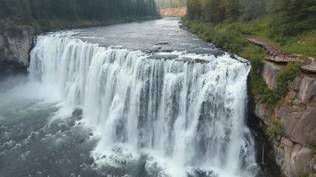 Large water fall during sunset in Alberta Canada