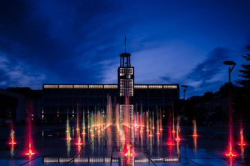 NIGHT IN THE CITY - A colorful fountain in front of the town hall in Koszalin