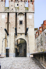 The front gate, draw bridge and bastions of the walled town of Sirmione, Lombardy, Italy