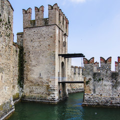 The front gate, draw bridge and bastions of the walled town of Sirmione, Lombardy, Italy