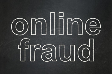 Fototapeta premium Safety concept: text Online Fraud on Black chalkboard background