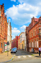 Fototapeta premium Beautiful narrow streets and traditional houses in the old town of Bruges (Brugge), Belgium