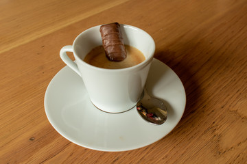 Espresso With Chocolate Finger and Saucer