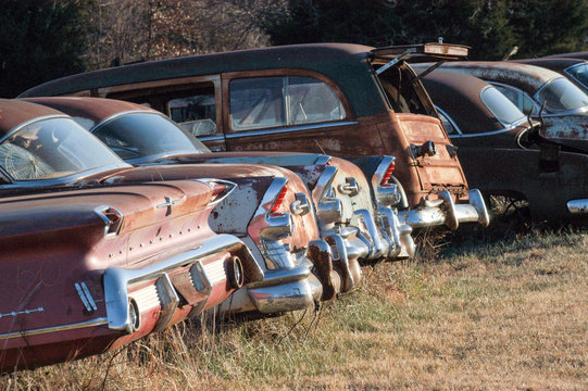 Vintage cars standing on wreckage junk yard, Oklahoma