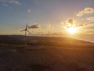 Wind turbine and sunset aerial image