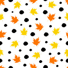 Seamless pattern with colorful maple leaves and black dots on the white background
