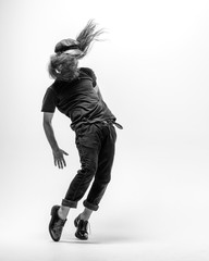 Young beautiful dancer posing in the studio