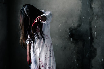 Horror Scene of a Woman with Bloody Hands .