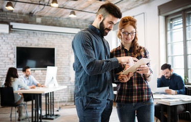Portrait of architects having discussion in office