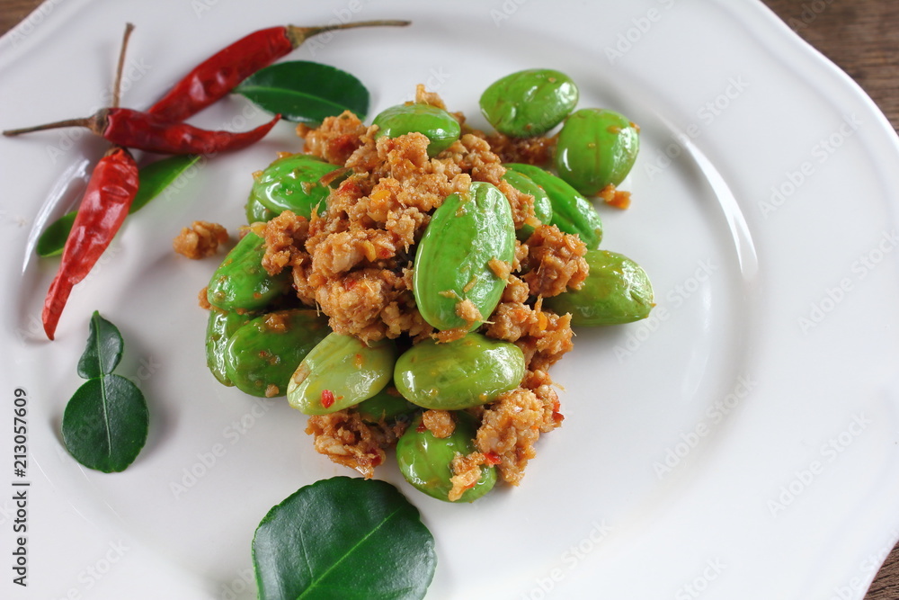 Poster fried pork with stink bean food in thailand