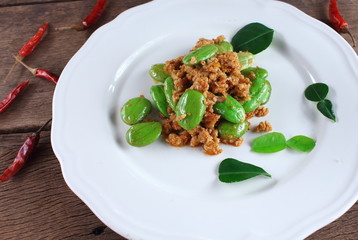 fried pork with stink bean food in thailand