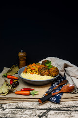 Kofta Tagine Moroccan Meatballs Served With Semolina and Vegetables
