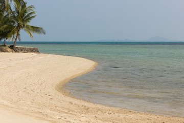 S shape seashore on turquoise water beach in Koh Phangan island, Thailand. Summertime in paradise, tourism travel destination concepts