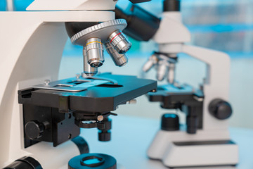 Four microscopes of different designs in the laboratory