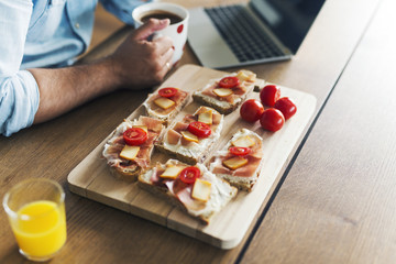 Sandwiches on wooden board