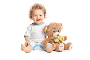 Baby boy with a teddy bear - Powered by Adobe