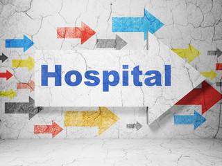 Healthcare concept:  arrow with Hospital on grunge textured concrete wall background, 3D rendering