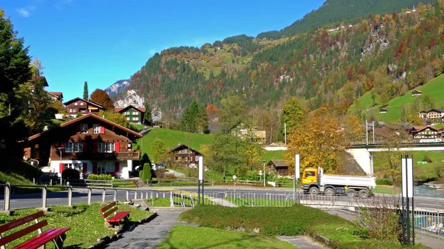 Traditional Chalets of village in Lauterbrunnen Valley at autumn, Berner Oberland, Switzerland