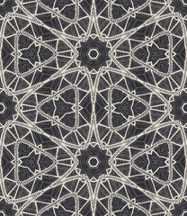 Vector seamless ethnic pattern with axial symmetry.