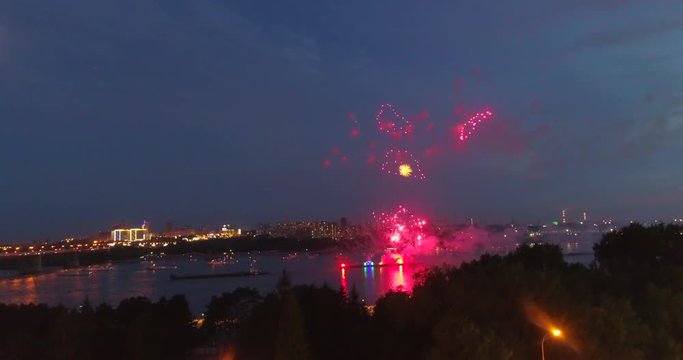 Exploding fireworks over the river