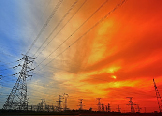 Fototapeta premium Electric tower, silhouette at sunset