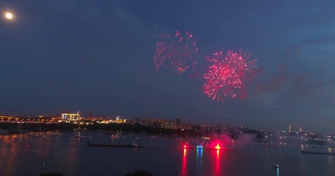 Exploding fireworks over the river