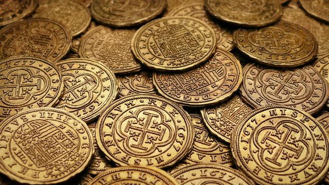 Passing Gold Coins Treasure Pile