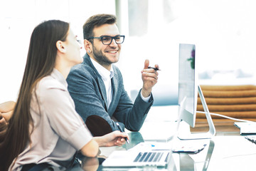 members of the business teams work with the data on the laptop on workplace