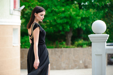 A woman walking down stairs