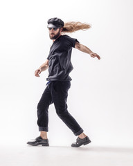 Young beautiful dancer posing in the studio
