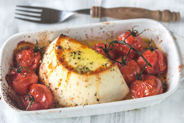 Baked ricotta with cherry tomatoes