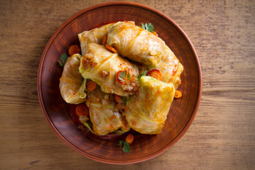 Stuffed cabbage leaves with meat, rice and vegetables. Chou farci, dolma, sarma, sarmale, golubtsy or golabki - popular dish in many countries. overhead, horizontal