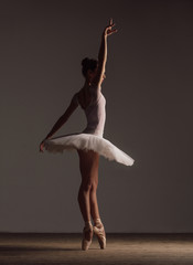 Young beautiful ballerina is posing in studio © Alexander Y