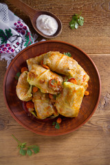 Stuffed cabbage leaves with meat, rice and vegetables. Chou farci, dolma, sarma, sarmale, golubtsy or golabki - popular dish in many countries. overhead, vertical