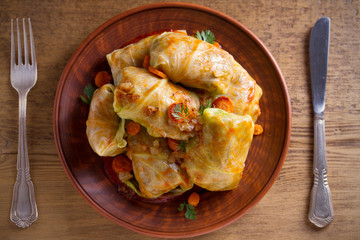 Stuffed cabbage leaves with meat, rice and vegetables. Chou farci, dolma, sarma, sarmale, golubtsy or golabki - popular dish in many countries. overhead, horizontal