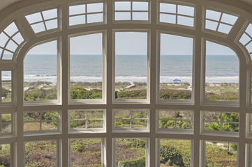 Fototapeta na wymiar living room large window overlooking ocean front