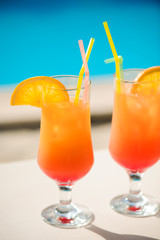 Cocktails on the background of the pool