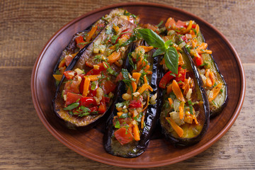 Pan fried eggplants with tomatoes, paprika, carrot, onion and garlic
